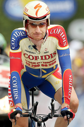 Great Britain's Bradley Wiggins finished the final 56km time trial in a respectable and drug-free 4 hours and 38 minutes.